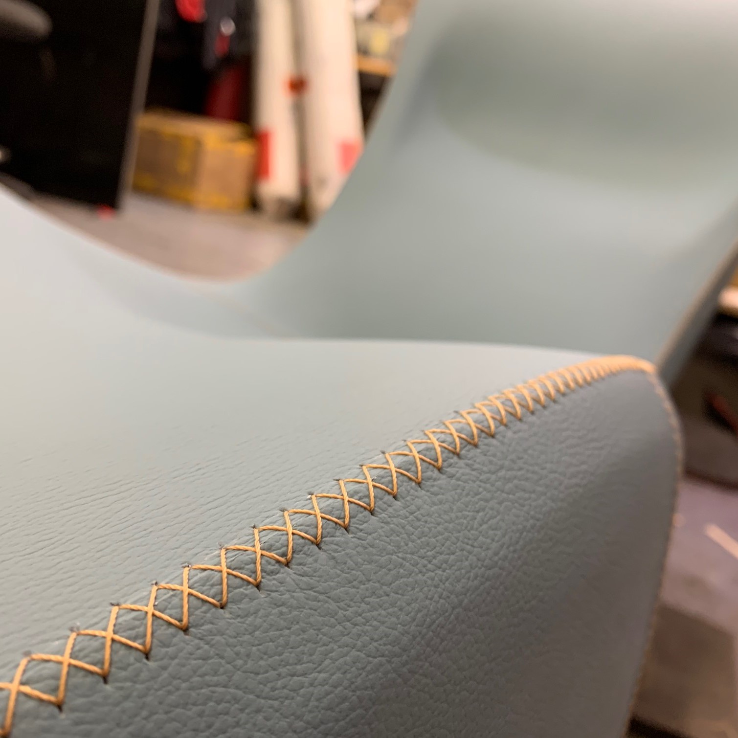 Stichting detail on the Bodice Rocker leather lounge chair.