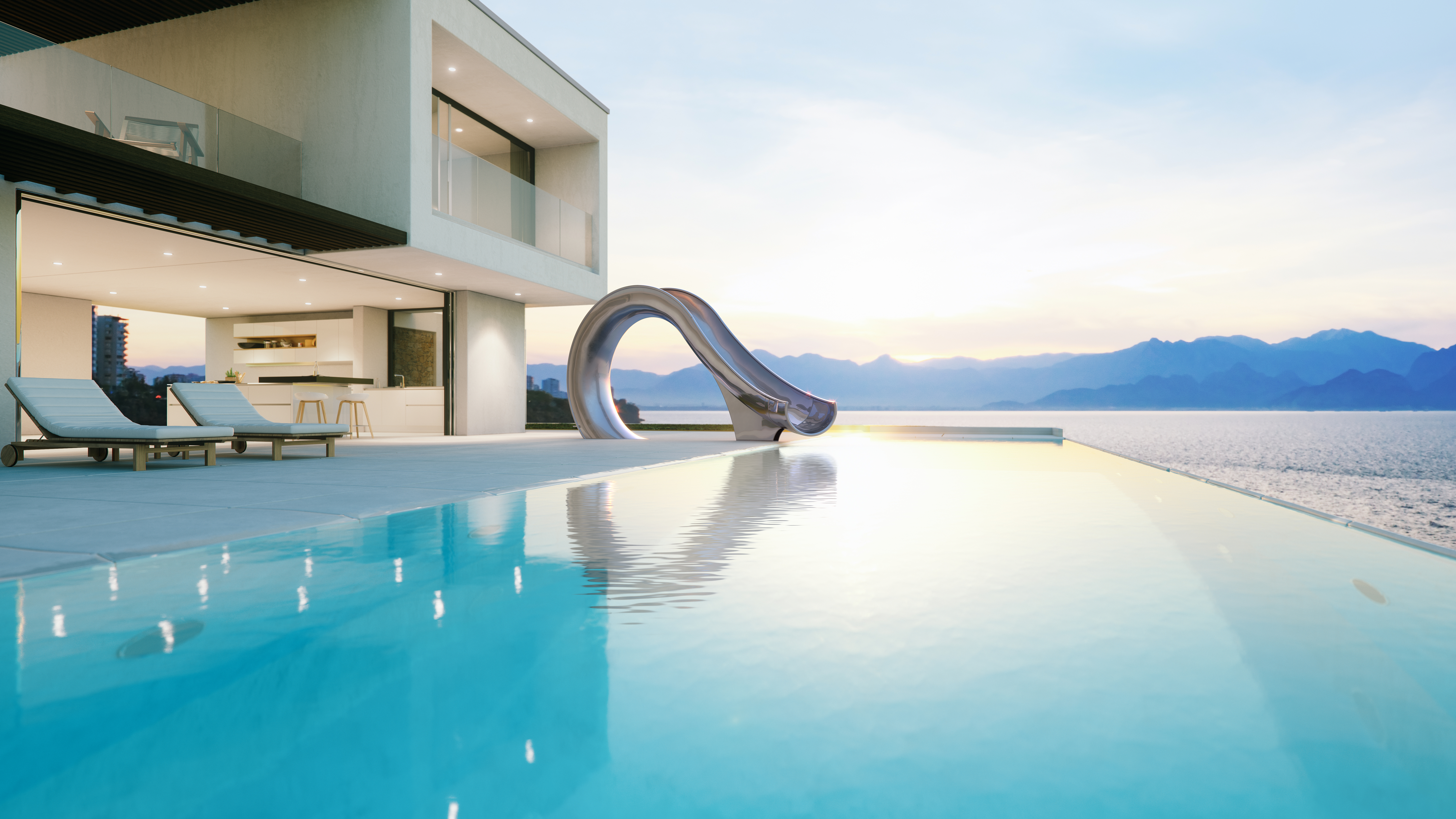Pool side sculptural water slide next to modern house at sunset