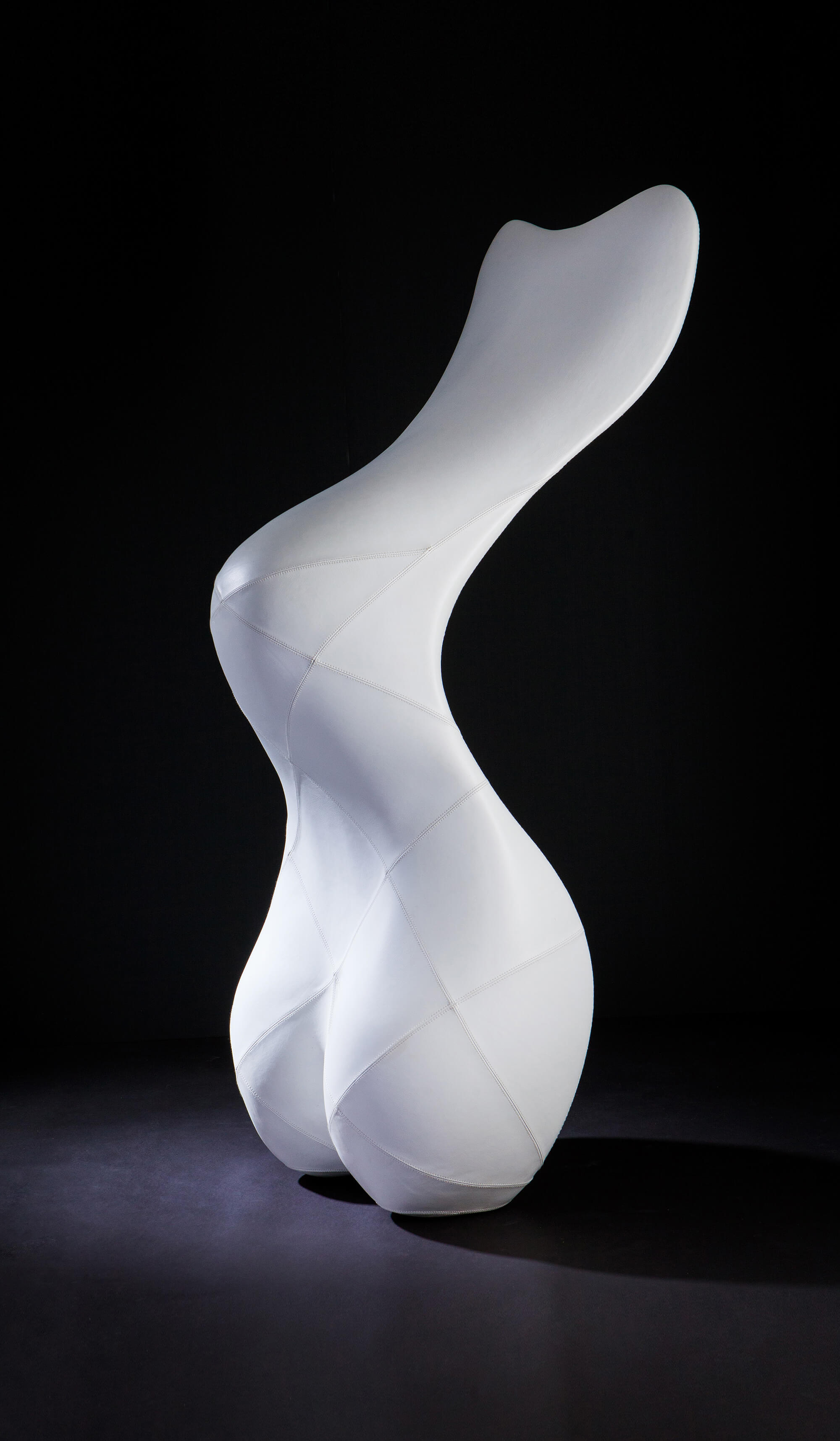 Custom made sculptural chair in white leather by Splinterworks.