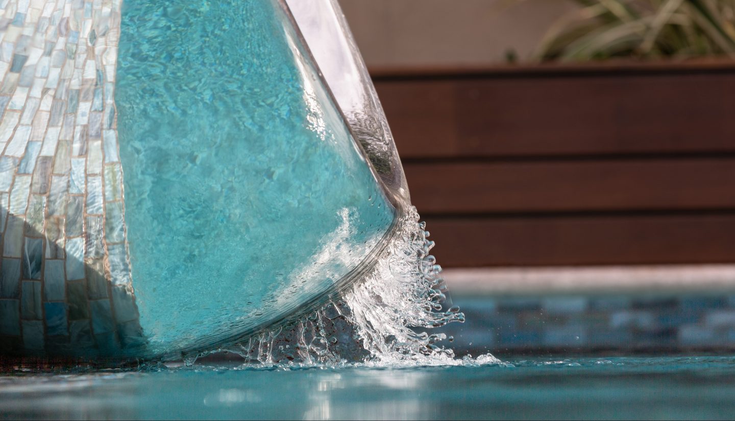 Water flowing from a stainless steel Splinterworks Vertex slide