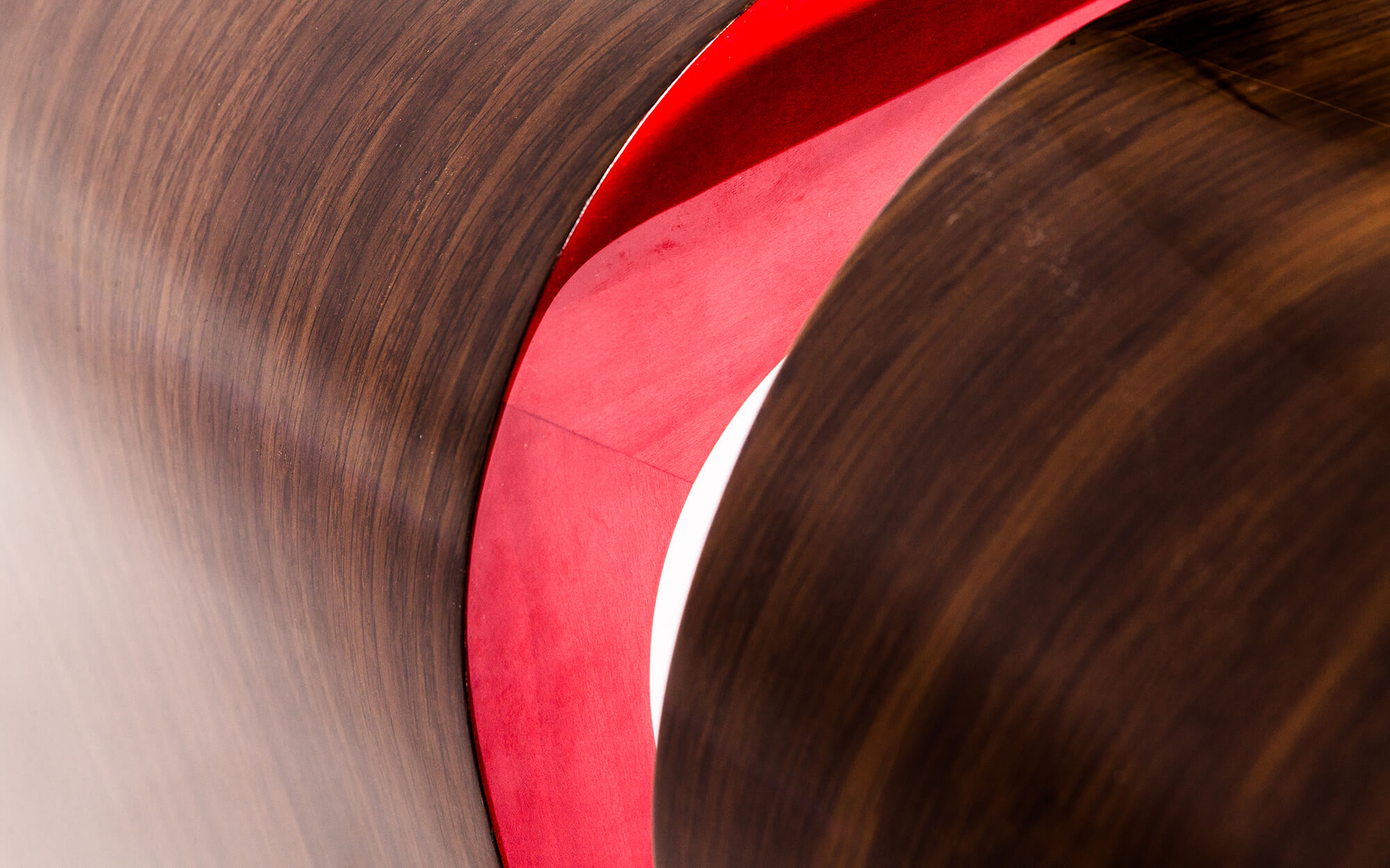 Close up of playful red detail on fun geometric pair of side tables