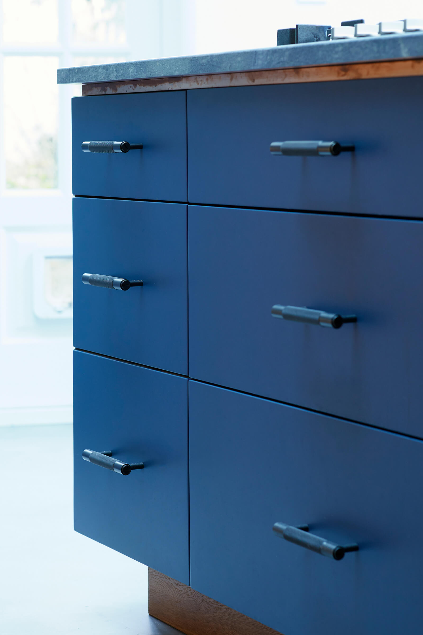 Blue kitchen cabinets hand-crafted by Splinterworks