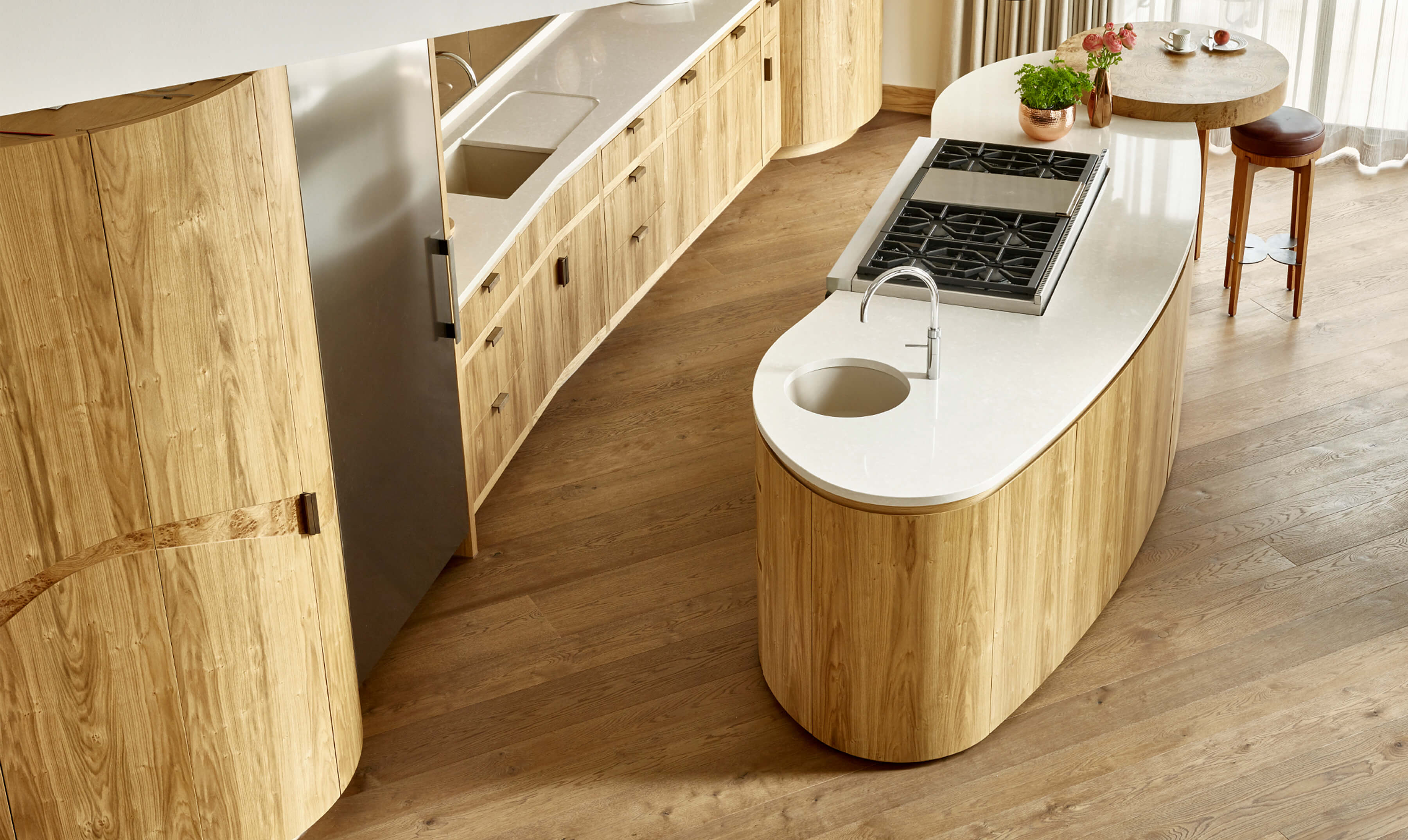 View of oak kitchen from above, with organic shaped kitchen island