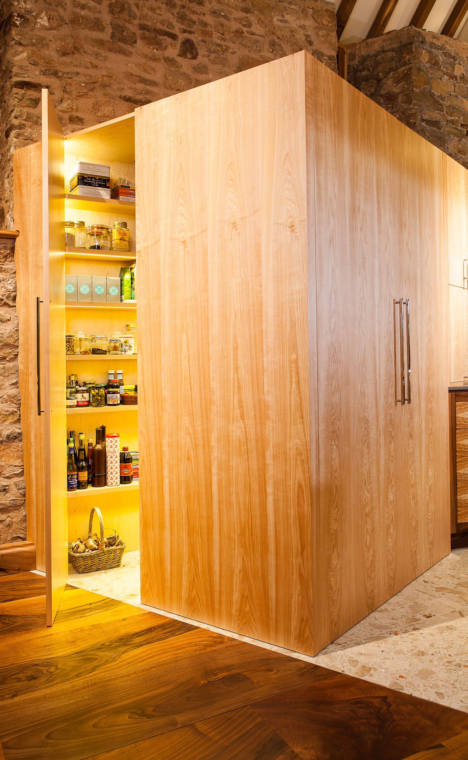 Hidden storage for contemporary kitchen in large open space