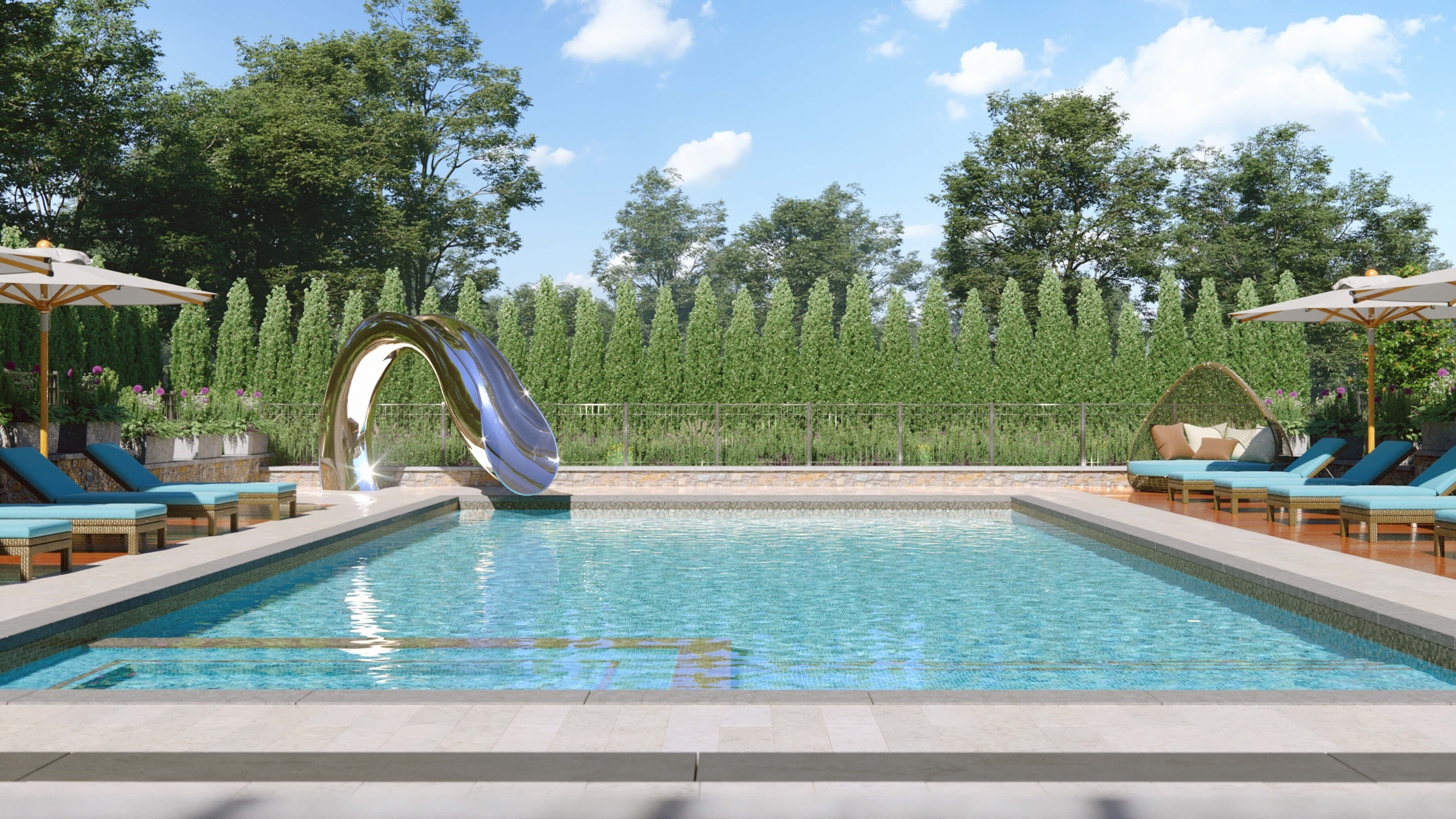 Custom water slide designed by Splinterworks next to pool with blue loungers.