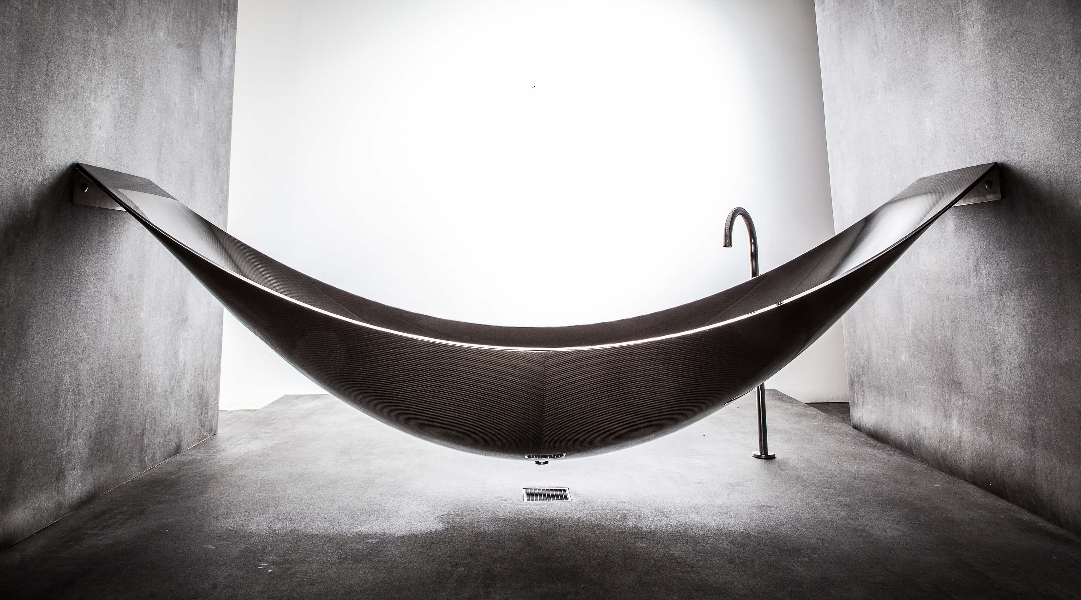 The hammock bath tub manufactured by Splinterworks custom made in black carbon fiber