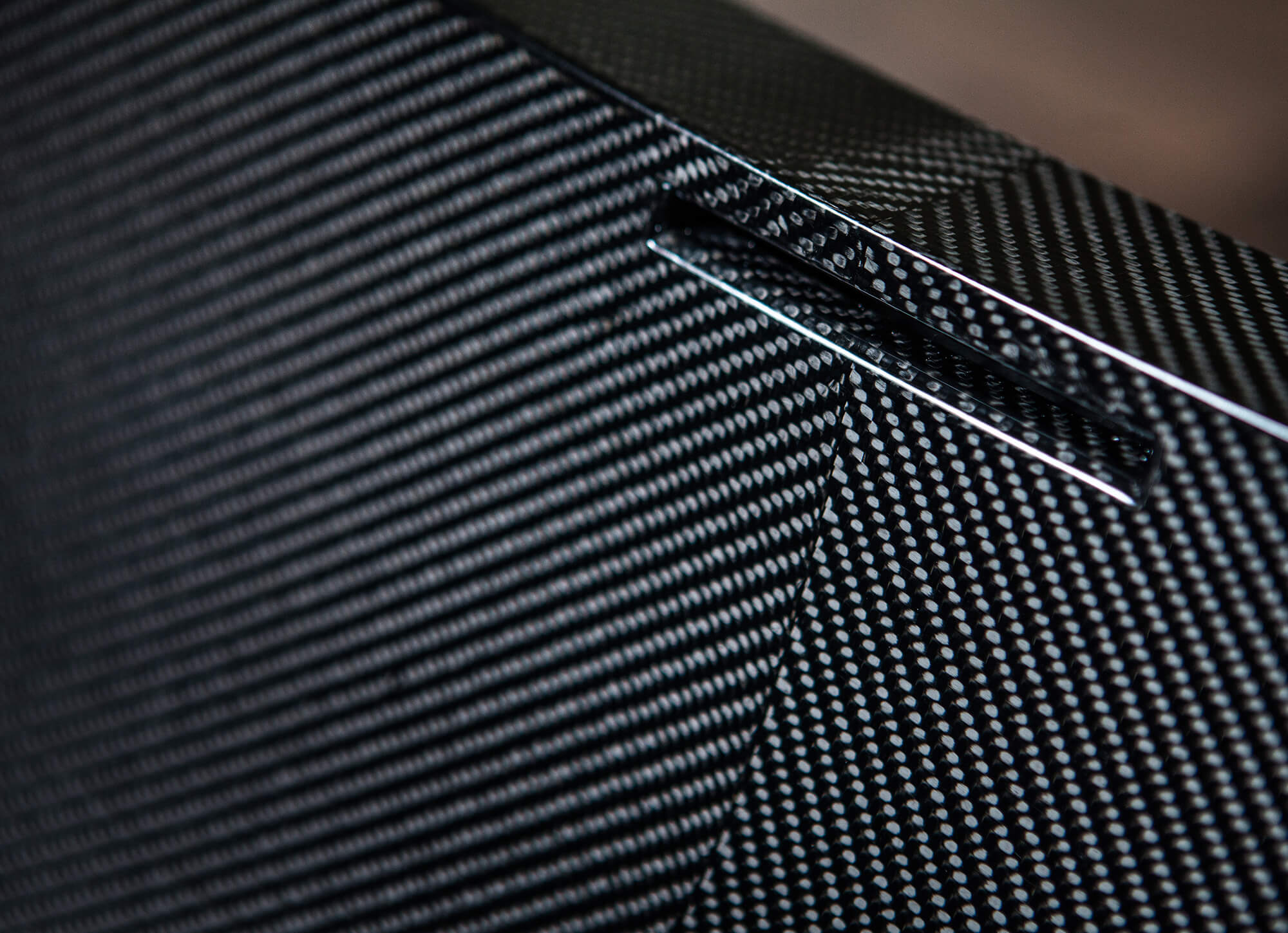 Close up detail of black carbon fibre bath tub.