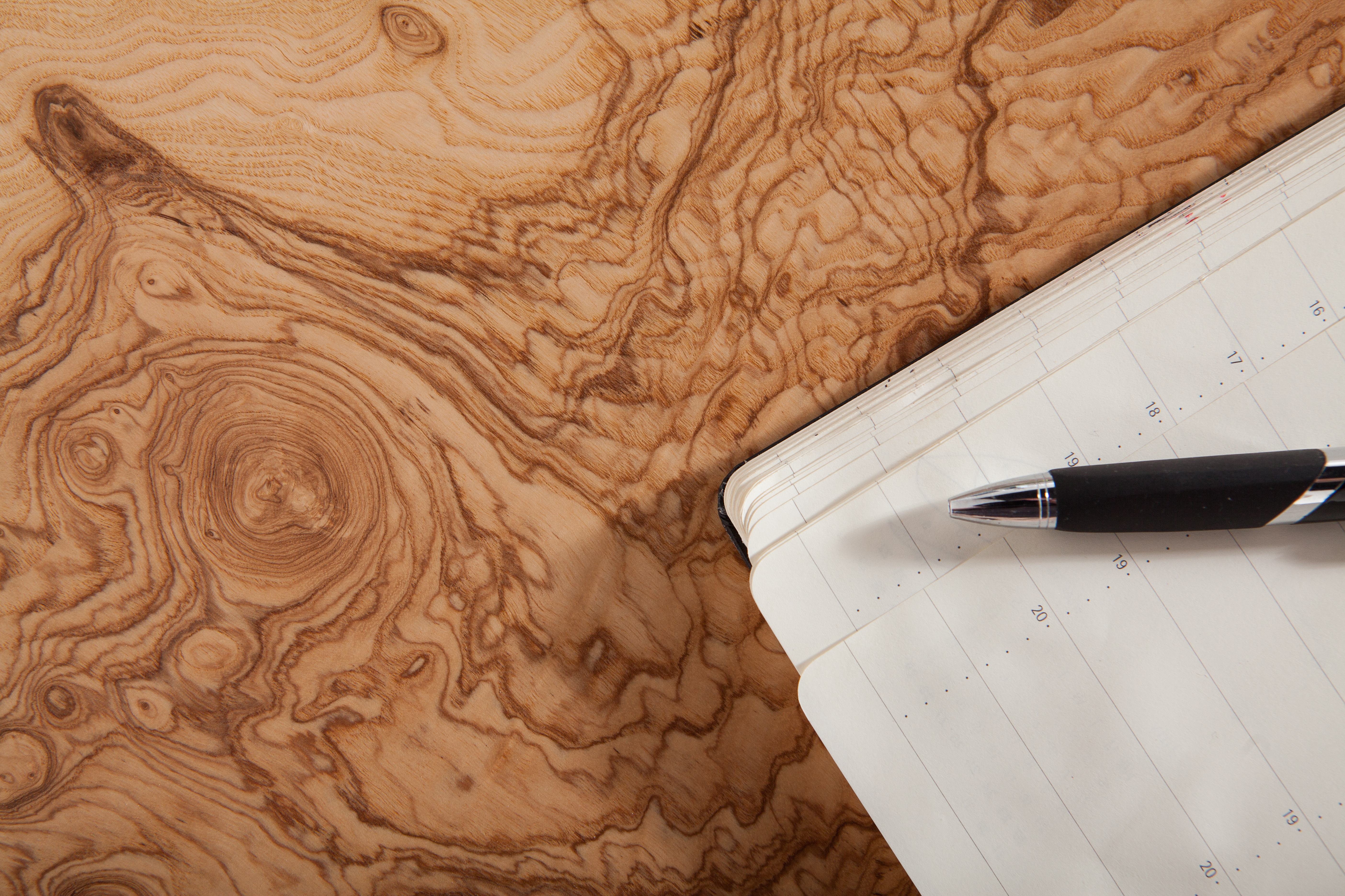 Exquisite unpolished veneer with fountain pen and diary for our bespoke furniture commissions