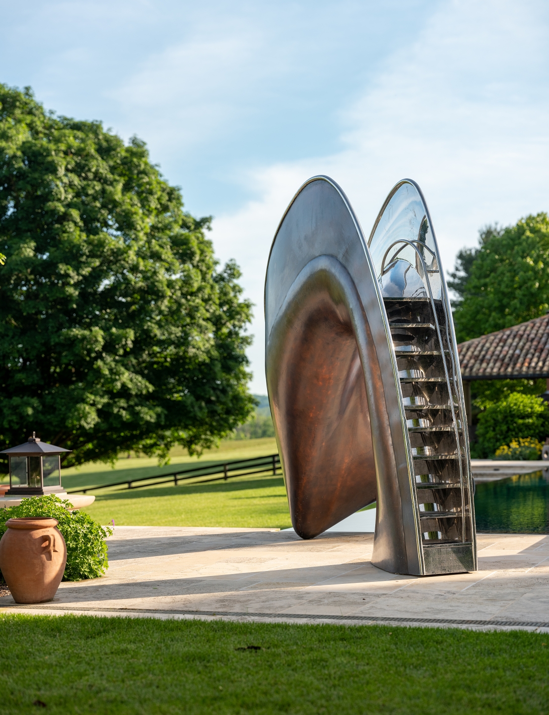 Step view of bronze vertex pool slide