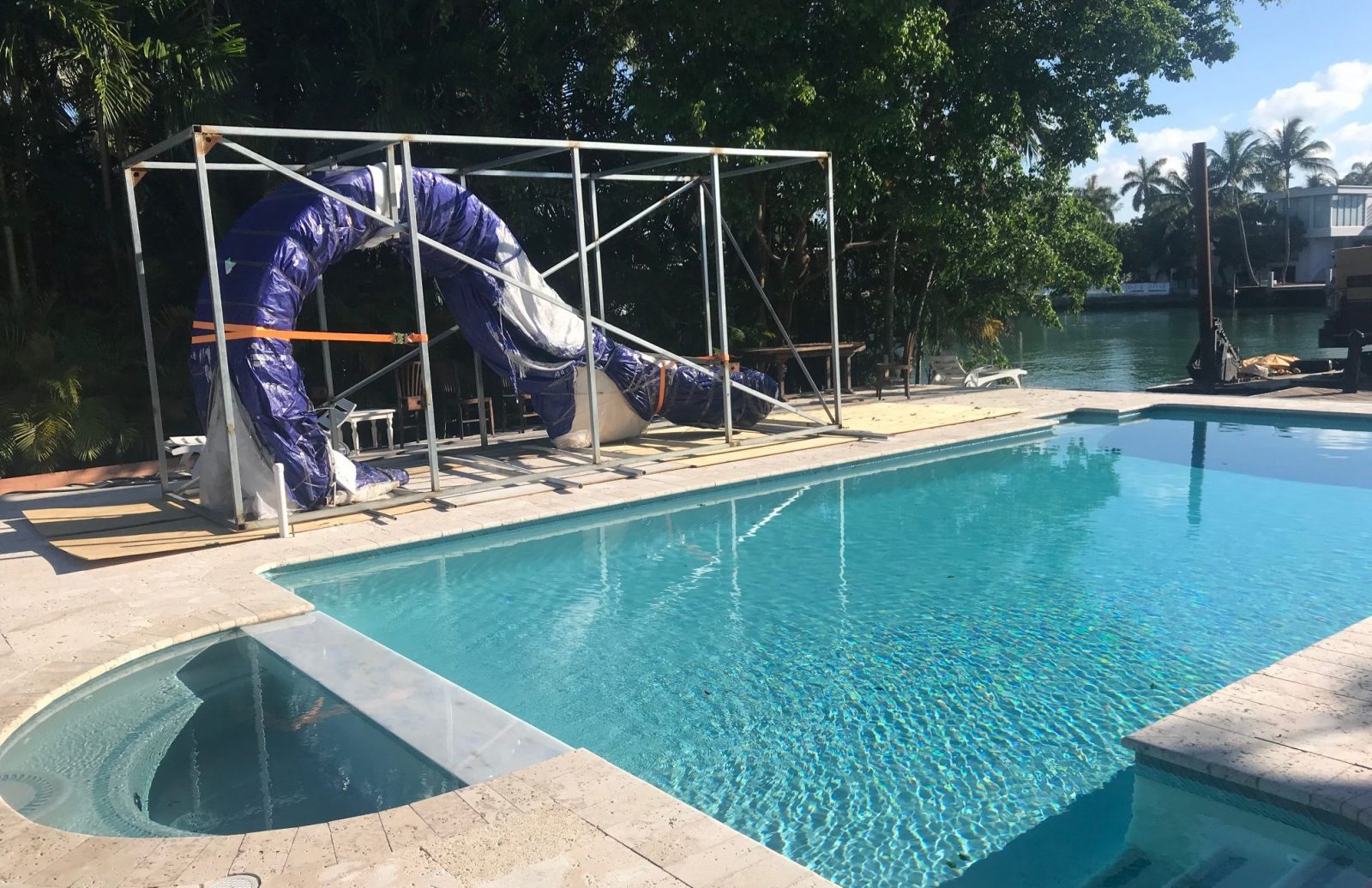 Splinterworks luxury pool slide Miami Florida installation