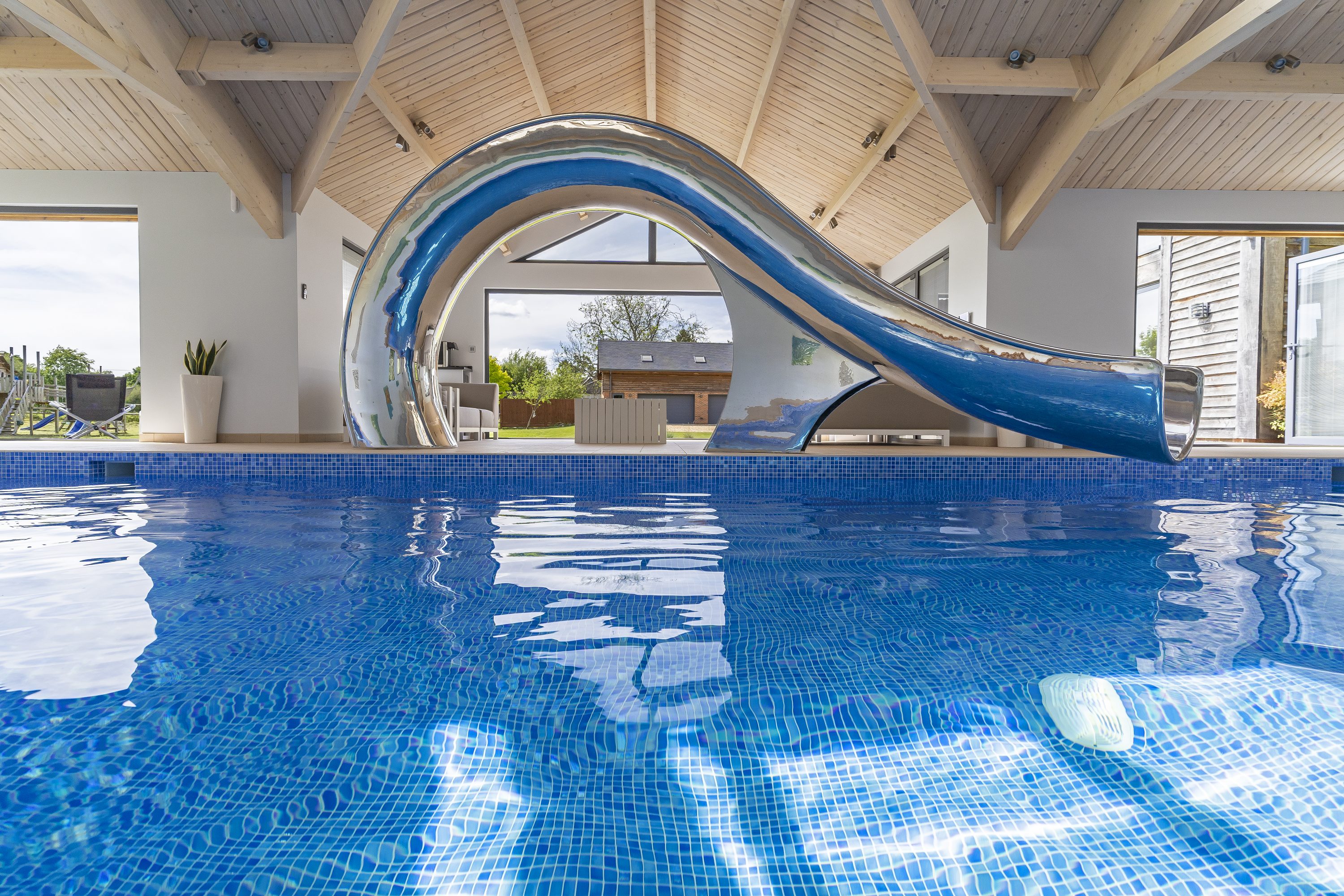 Across pool view of water slide